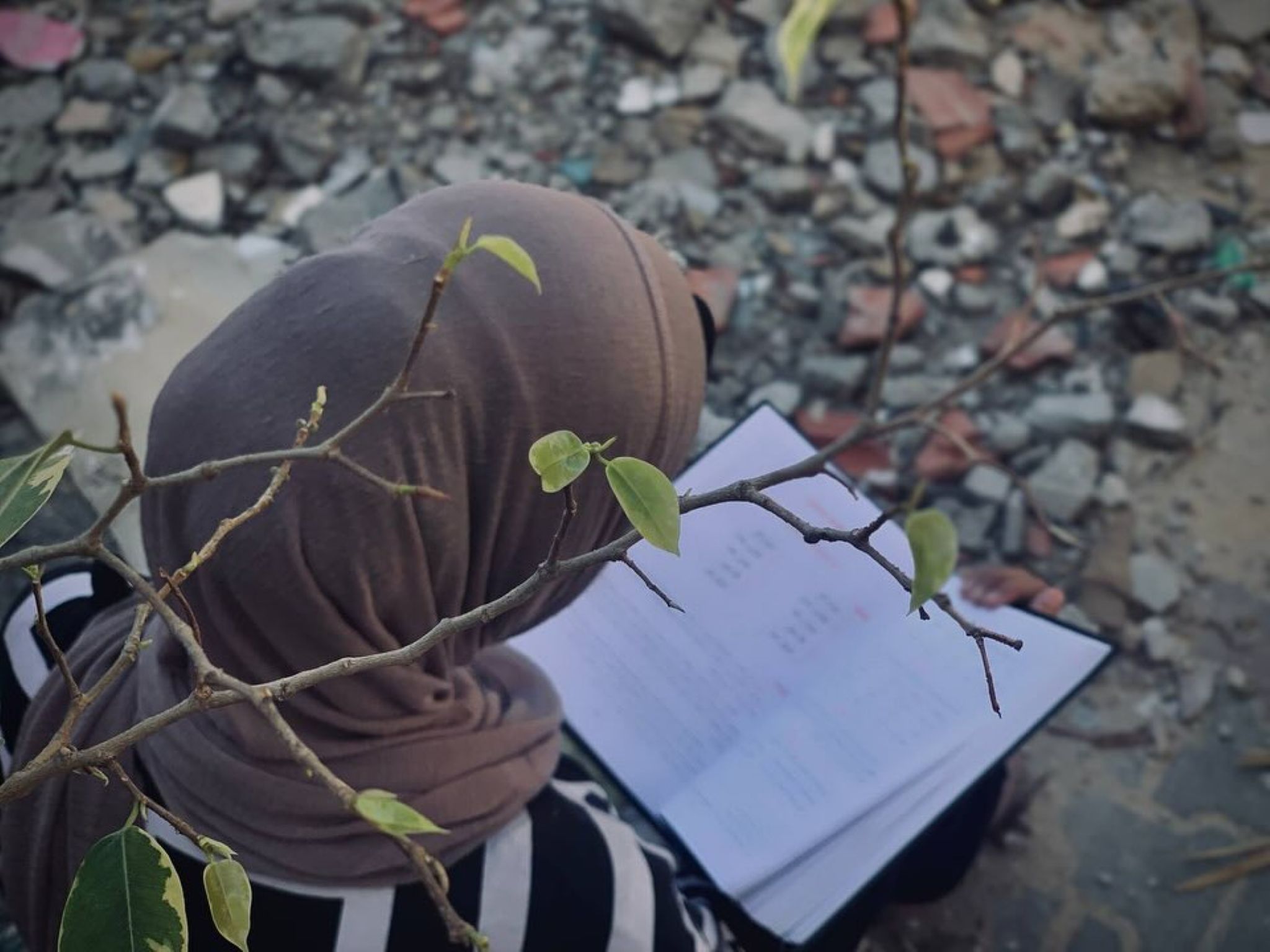https://newyorkwarcrimes.com/media/pages/a-student-from-bureij-writes-to-a-teacher-from-baghdad/101181f530-1757463159/haneen_8.jpg